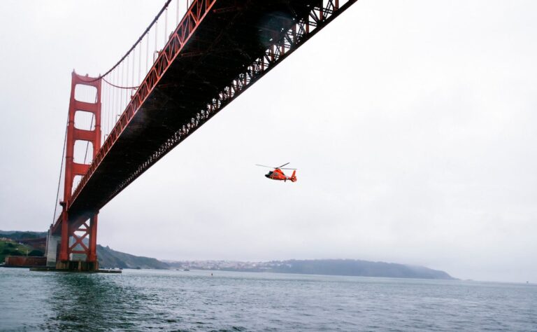 Rescue Helicopter Flying Under Golden Gate Bridge