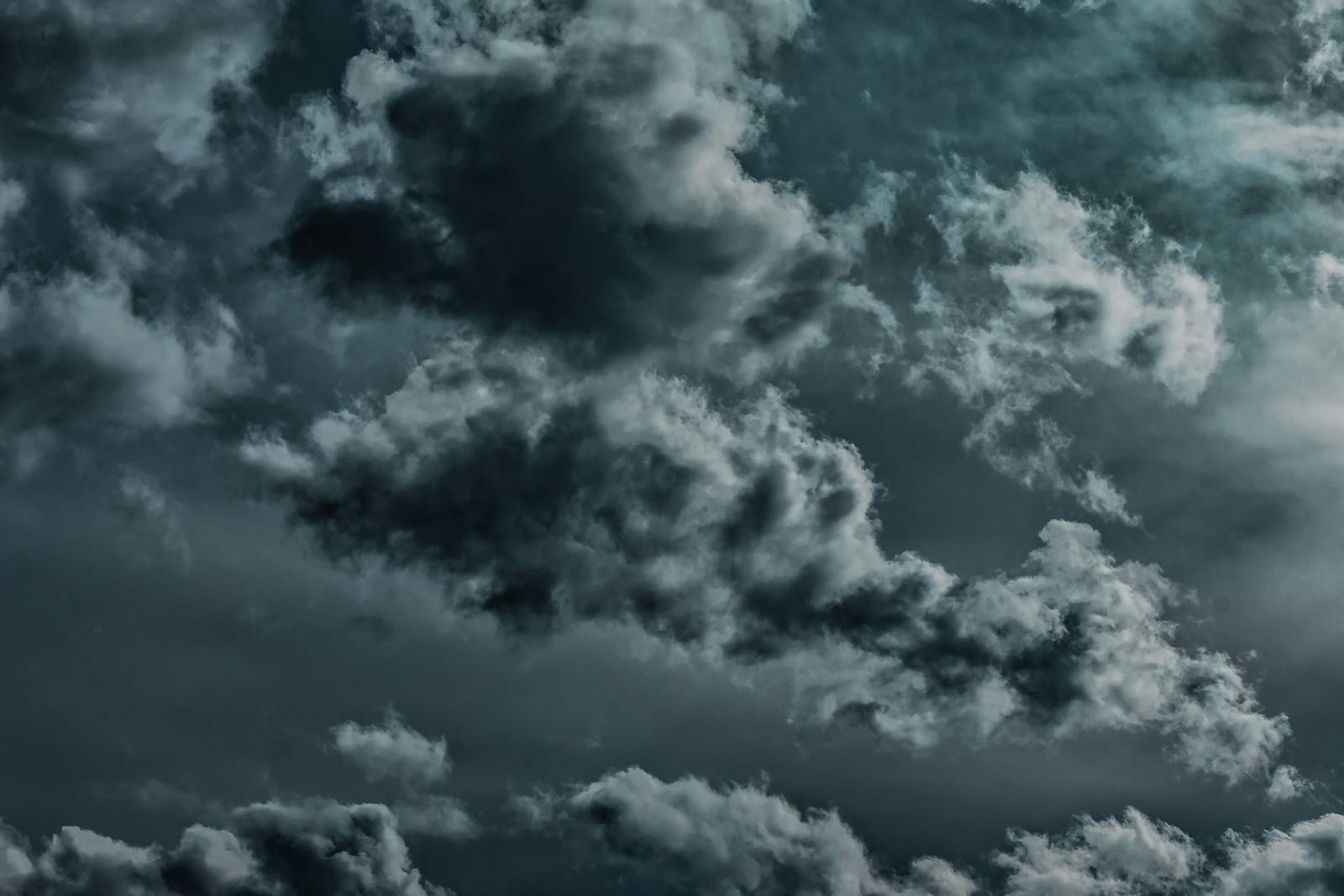 Moody and dramatic image of dark storm clouds forming in the sky.