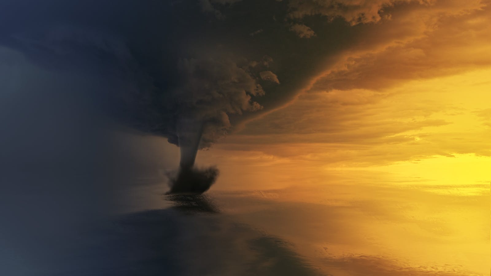 A powerful tornado over the ocean during a dramatic sunset, capturing the storm's intensity and beauty.